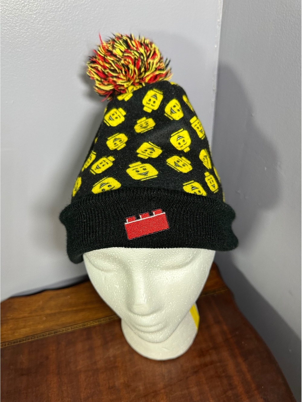 LEGO Black Beanie Hat with Yellow Minifigure Faces and Pom Pom